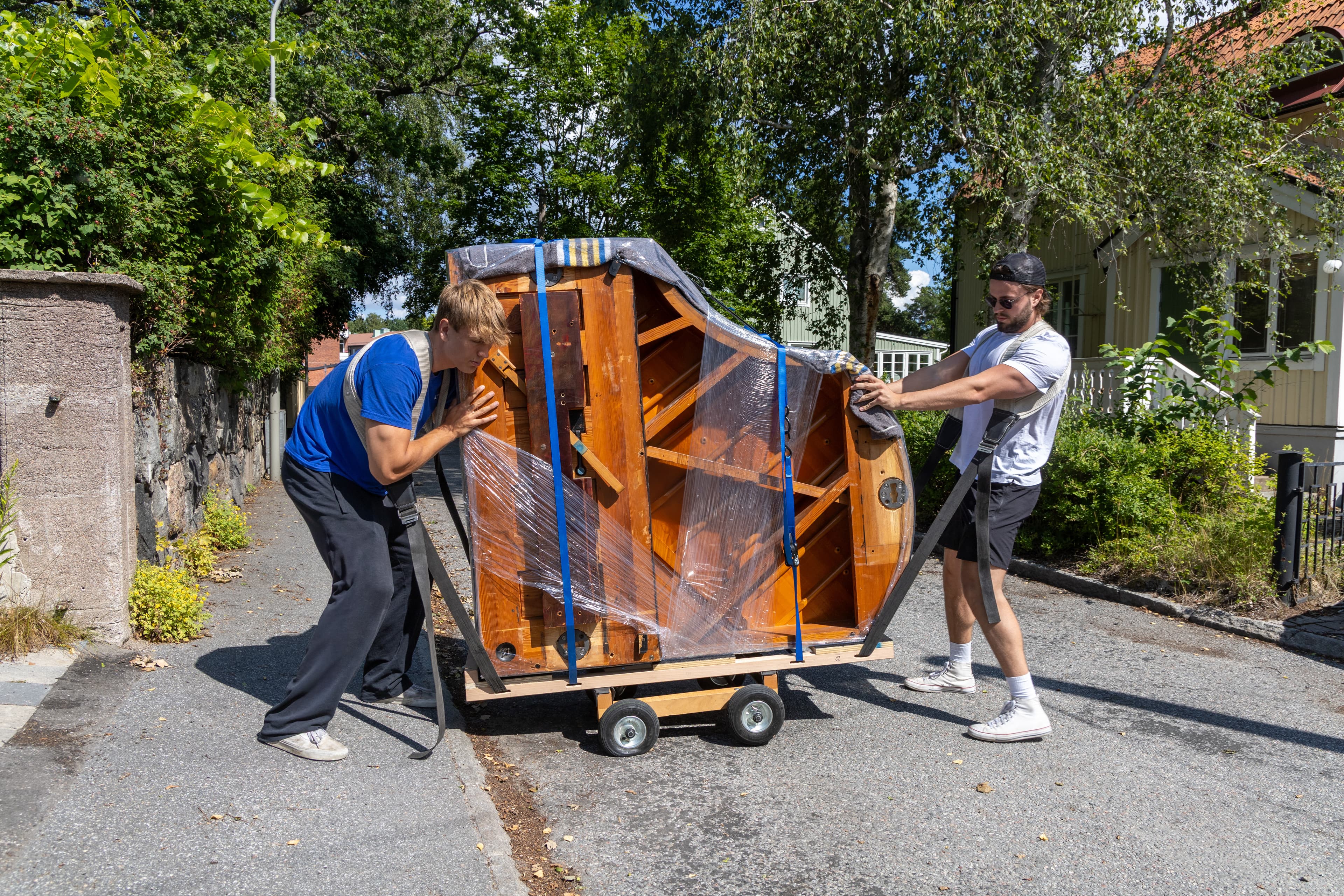 Specialist team transporting a grand piano